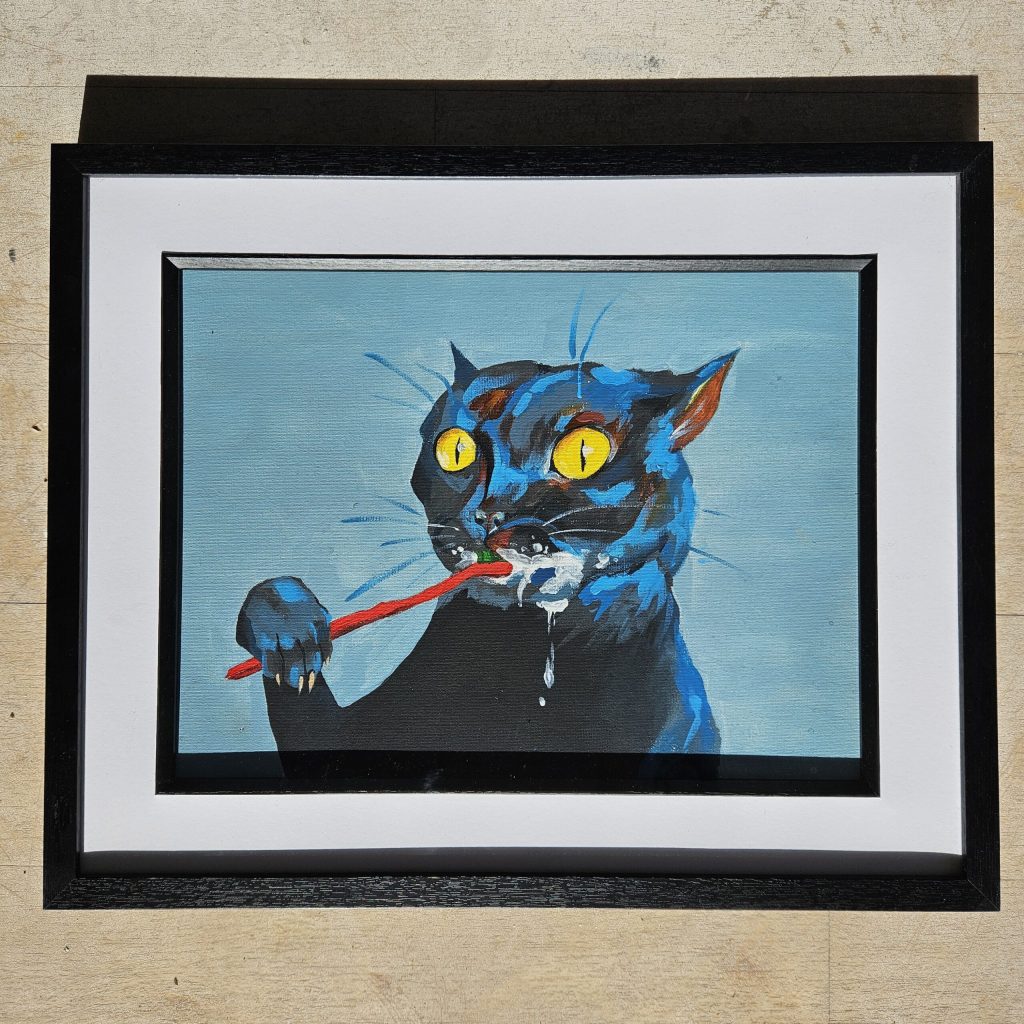 Thumbnail - Cat and Toothbrush